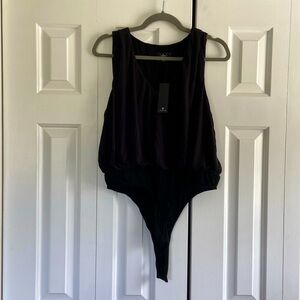 Large, black, lulu’s tank top/bodysuit. New with tags never been worn.